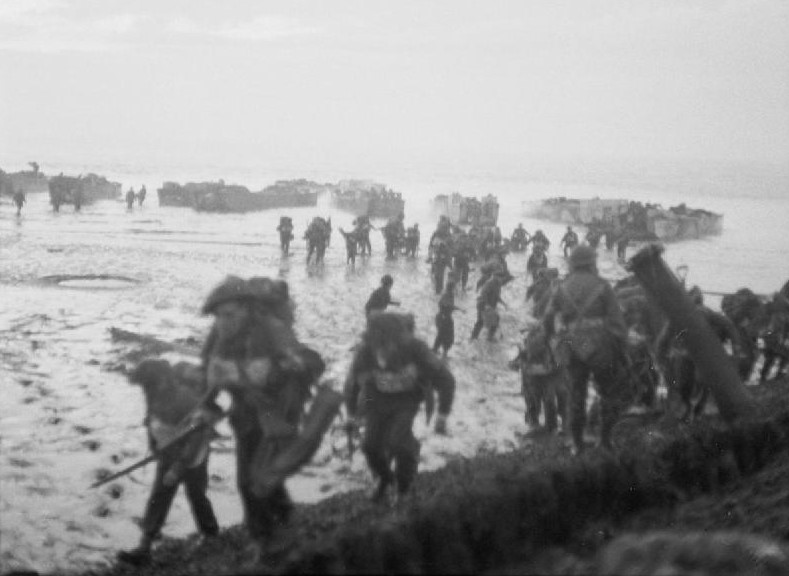 Royal Marines come ashore at Walcheren as part of the assault from the sea