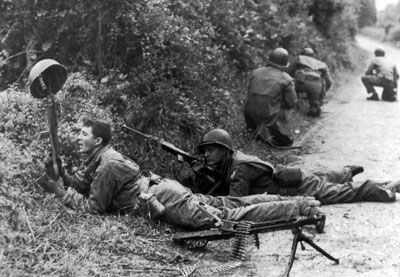 US Riflemen check the other side of the Bocage