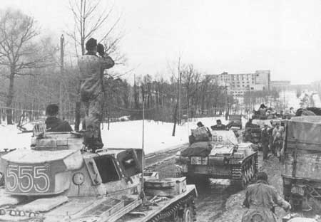 Panzer IIIs moving a road