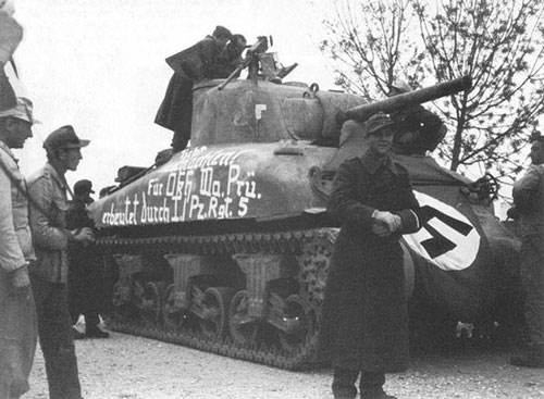 M4 Sherman with some writing on the side (Mid section) of the tank. “Für OKH, Prü erbeutet durch I. / Pz.Rgt.5” “For OKH, Examination. Captured by I. / Pz.Rgt.5”